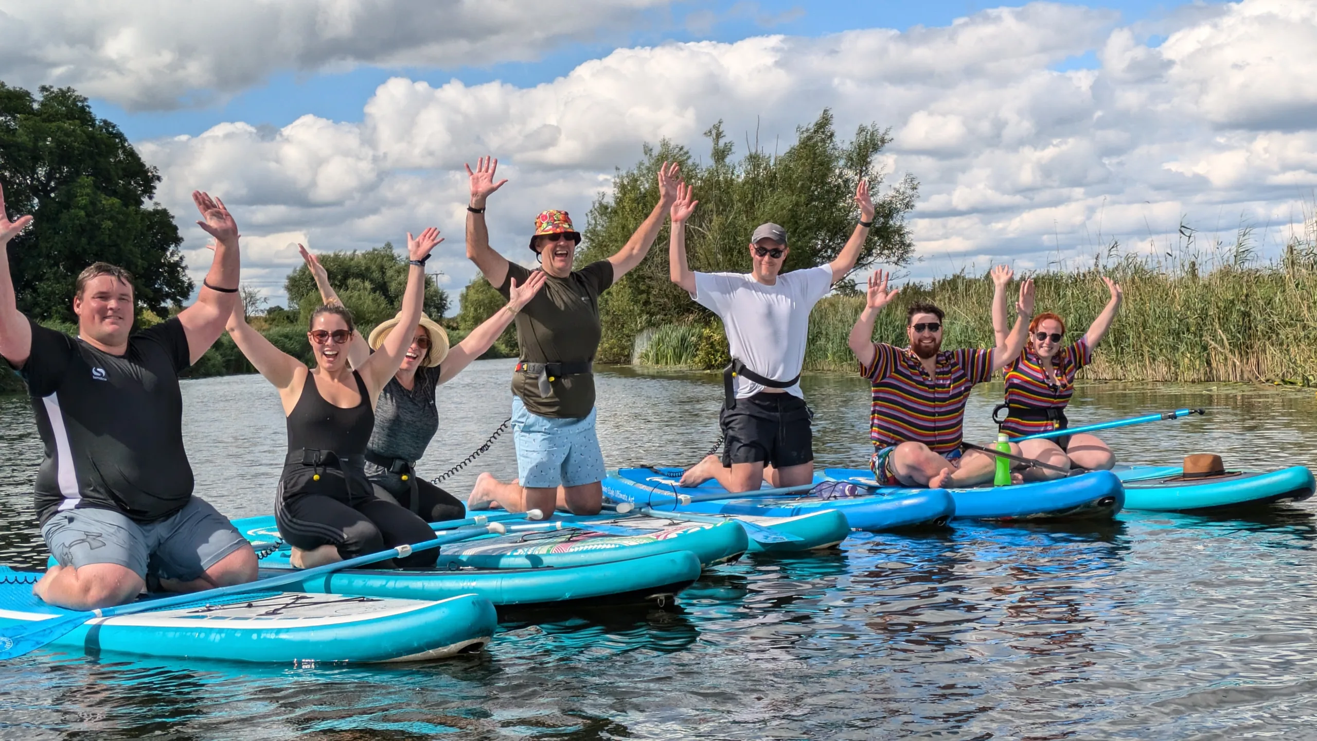Team paddleboarding on the River Avon, Worcestershire