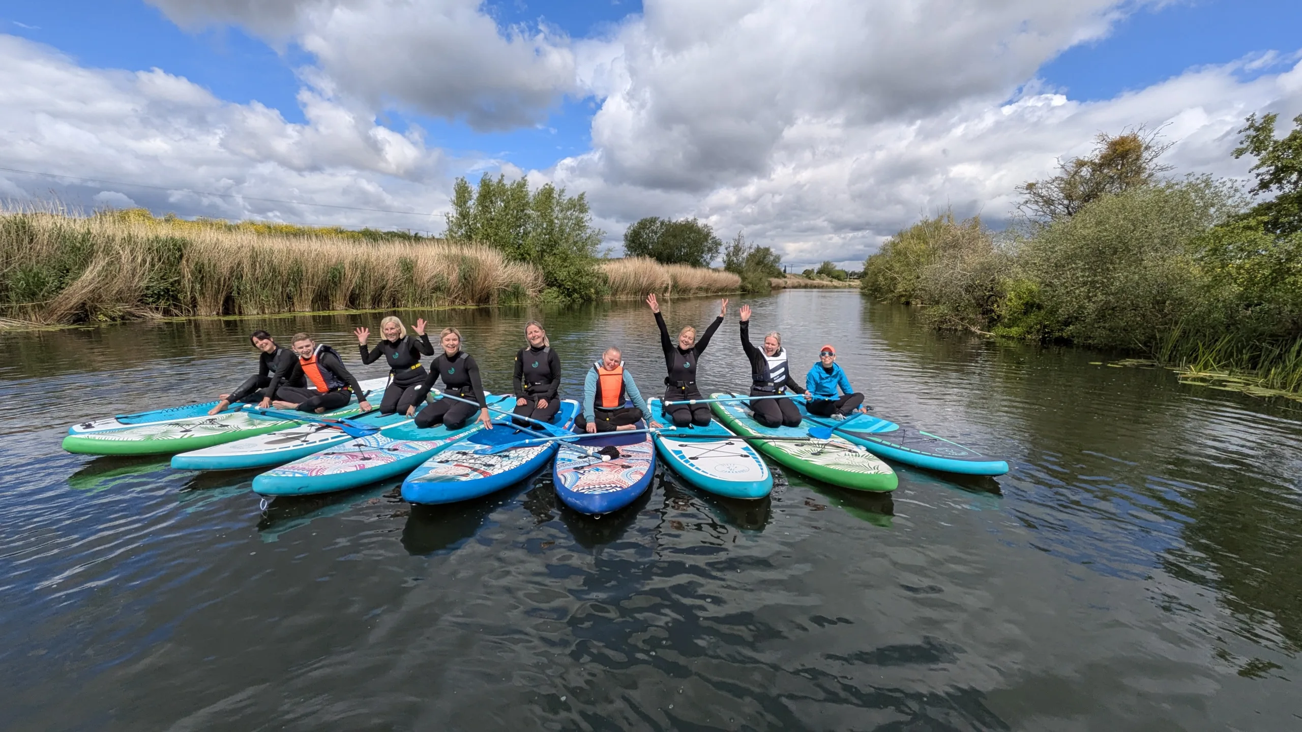 Corporate team on the water at Wittering SUP